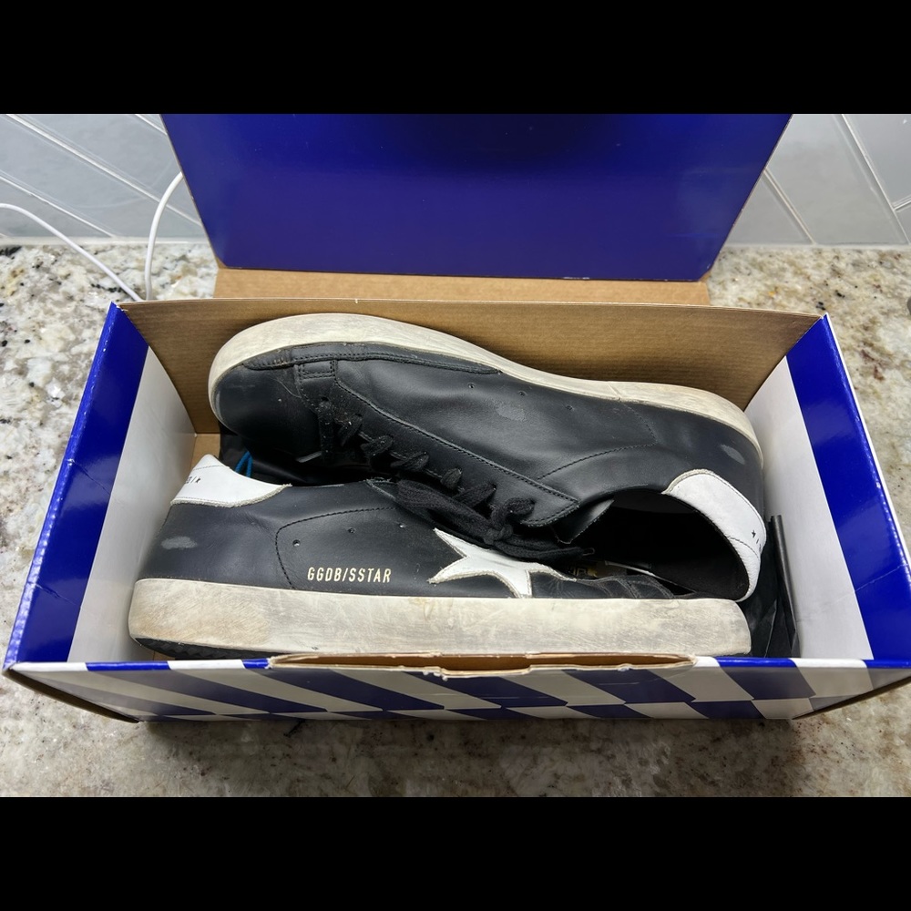 Golden Goose Black Superstar Sneakers in leather with White Star